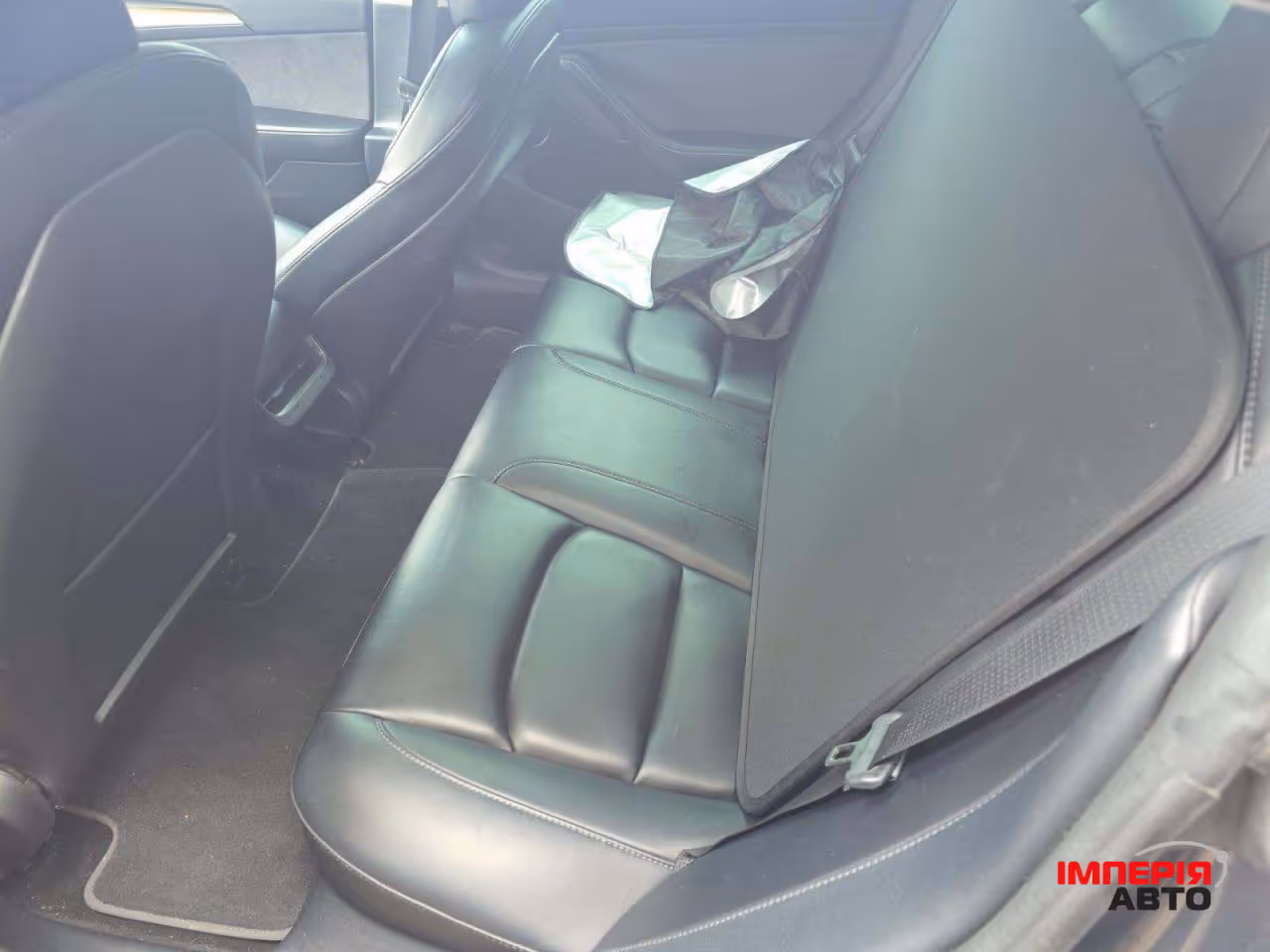 Tesla Model 3 - фото 7