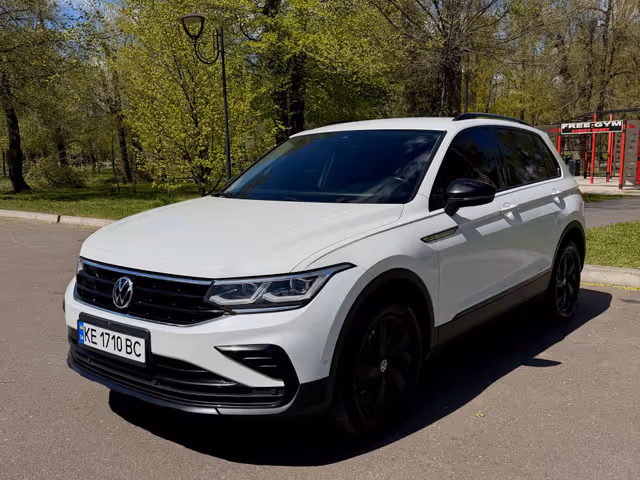 Volkswagen Tiguan - фото 1