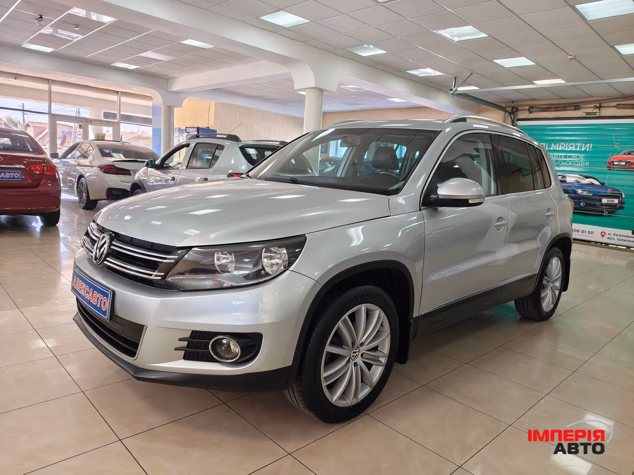 Volkswagen Tiguan - фото 1