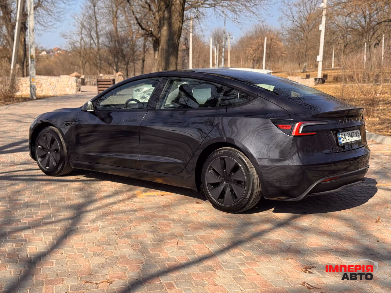 Tesla Model 3 - фото 12