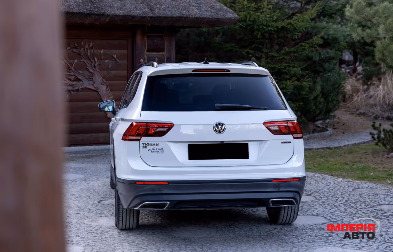 Volkswagen Tiguan - фото 5