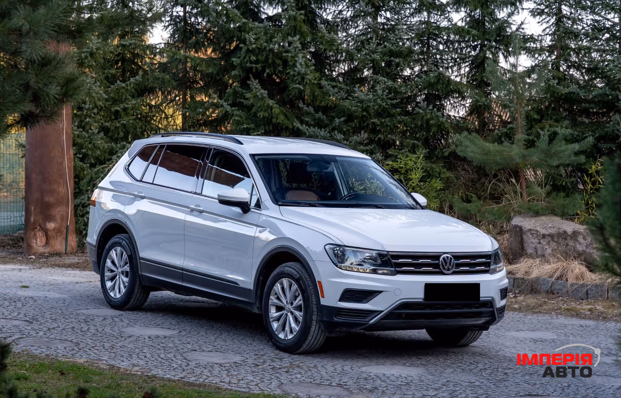 Volkswagen Tiguan - фото 1