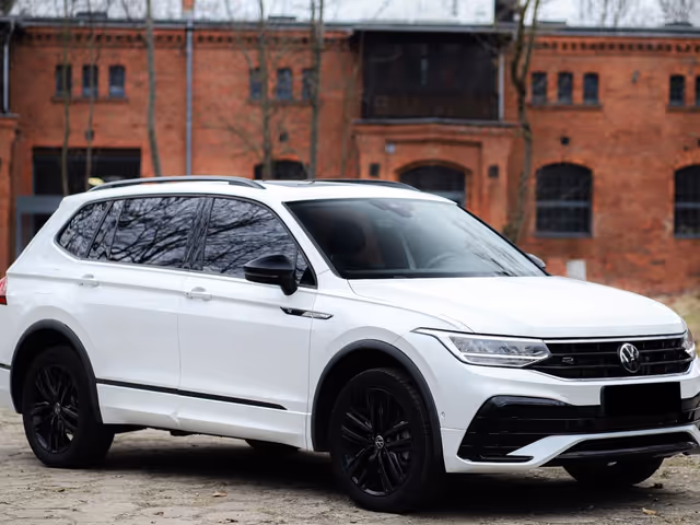 Volkswagen Tiguan - фото 1