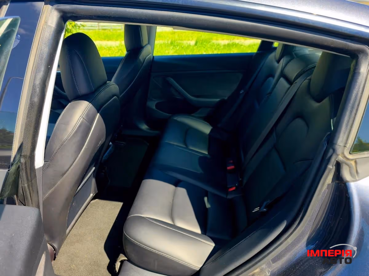 Tesla Model 3 - фото 10