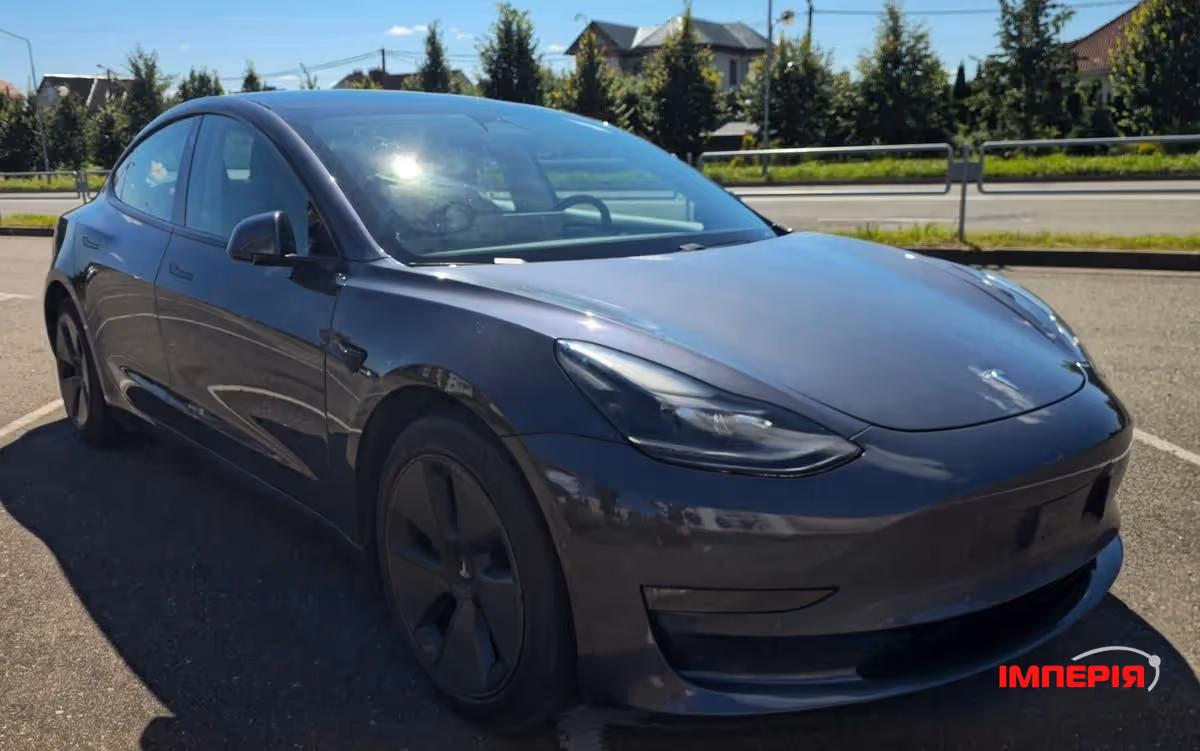 Tesla Model 3 - фото 1