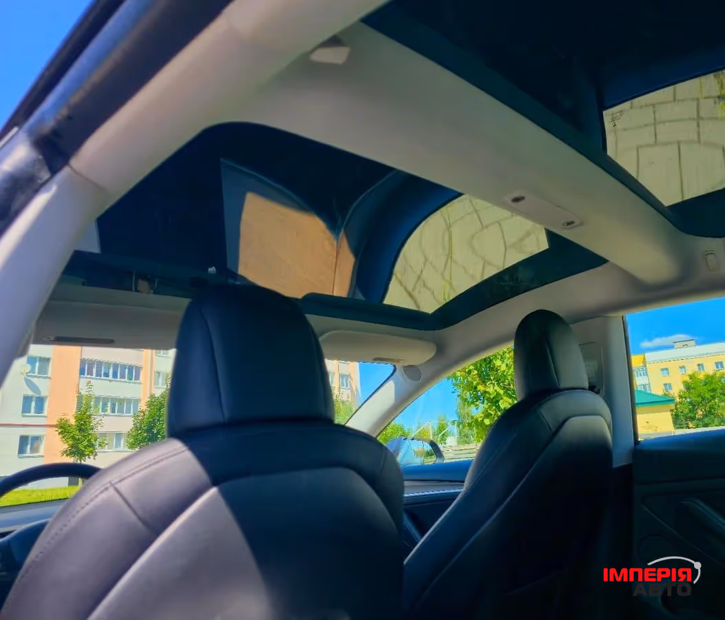 Tesla Model 3 - фото 11