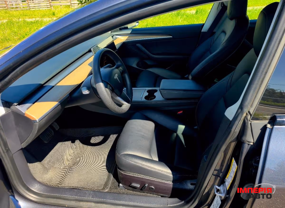 Tesla Model 3 - фото 9