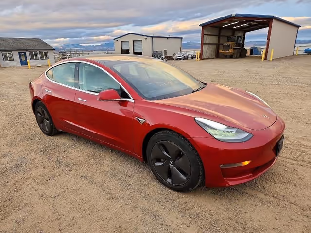 Tesla Model 3 - фото 2