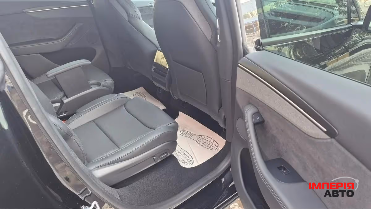 Tesla Model Y - фото 10
