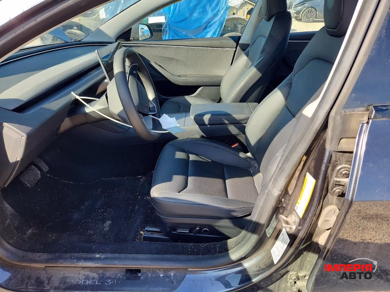 Tesla Model 3 - фото 8