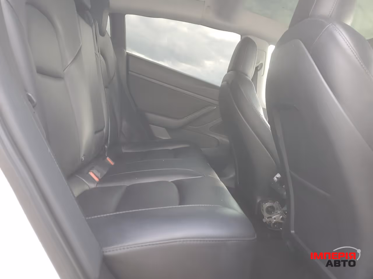 Tesla Model 3 - фото 9