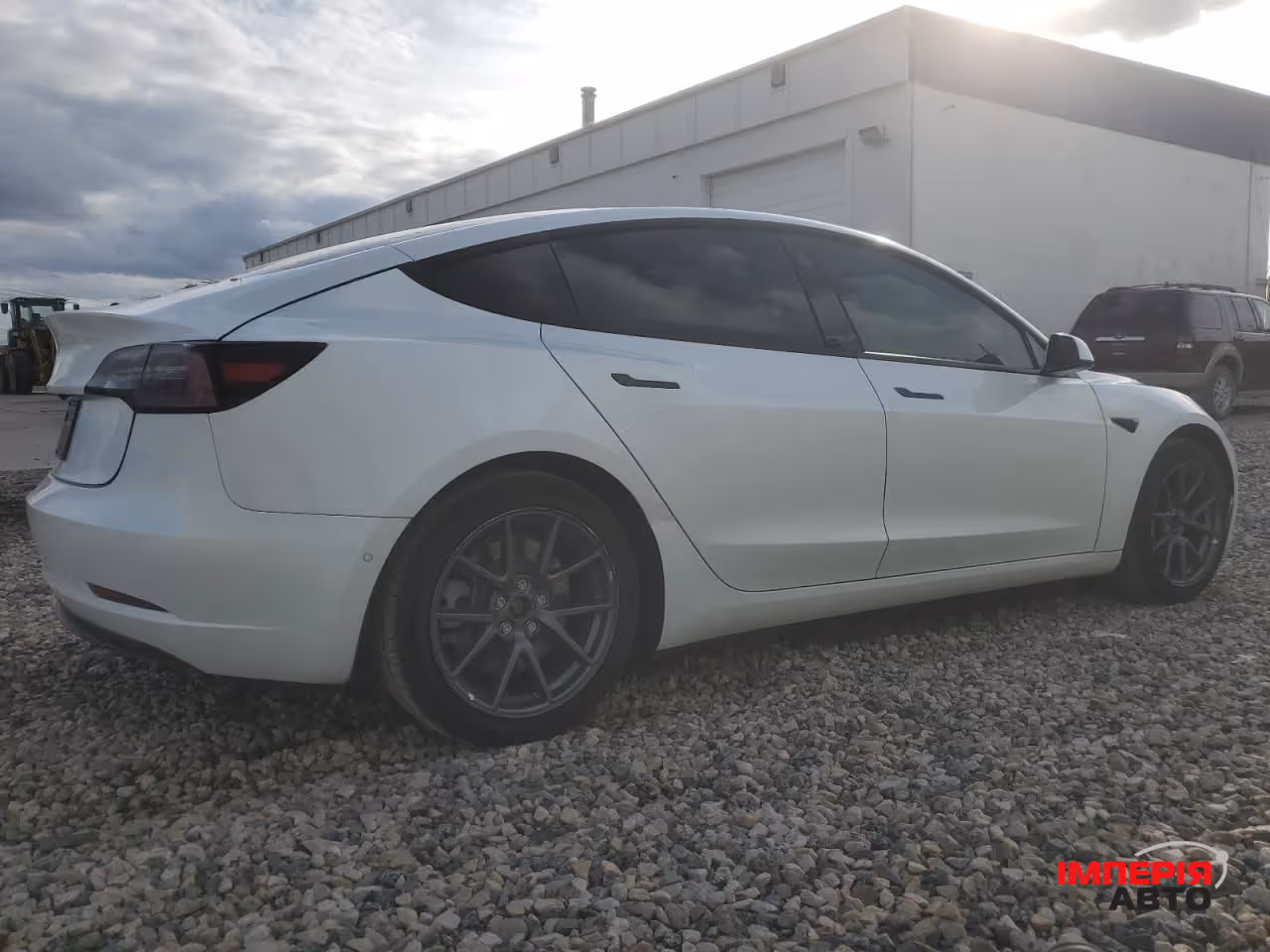 Tesla Model 3 - фото 5