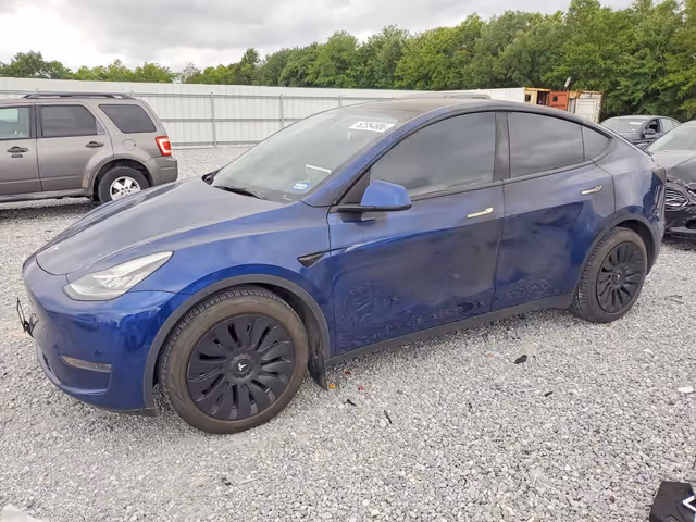 Tesla Model Y - фото 2