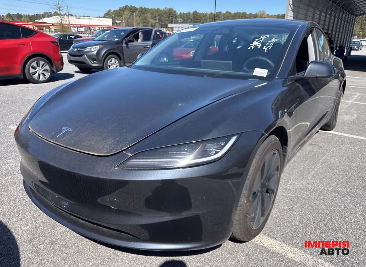 Tesla Model 3 - фото 1