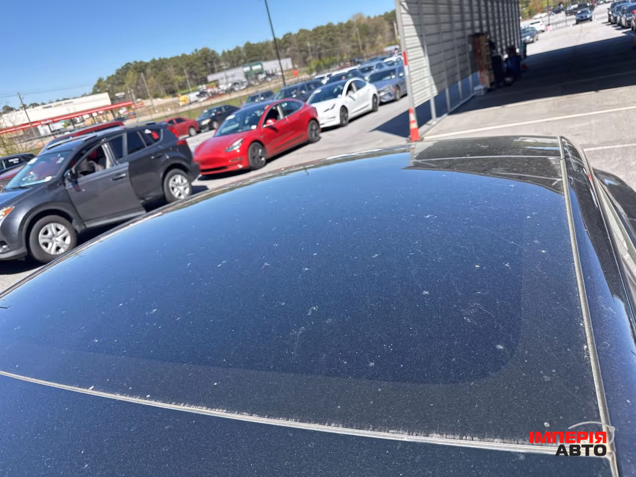 Tesla Model 3 - фото 11