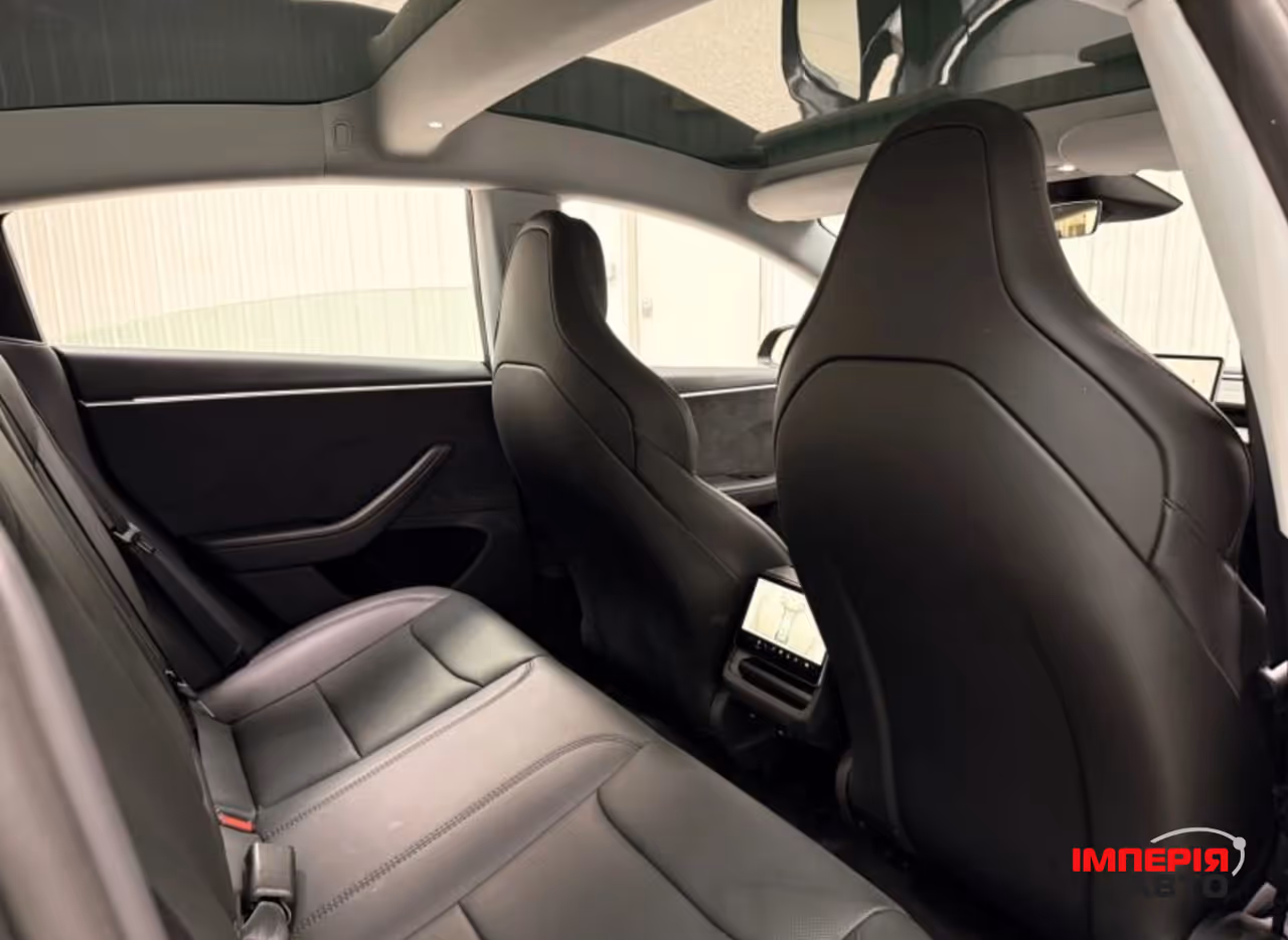 Tesla Model 3 - фото 8