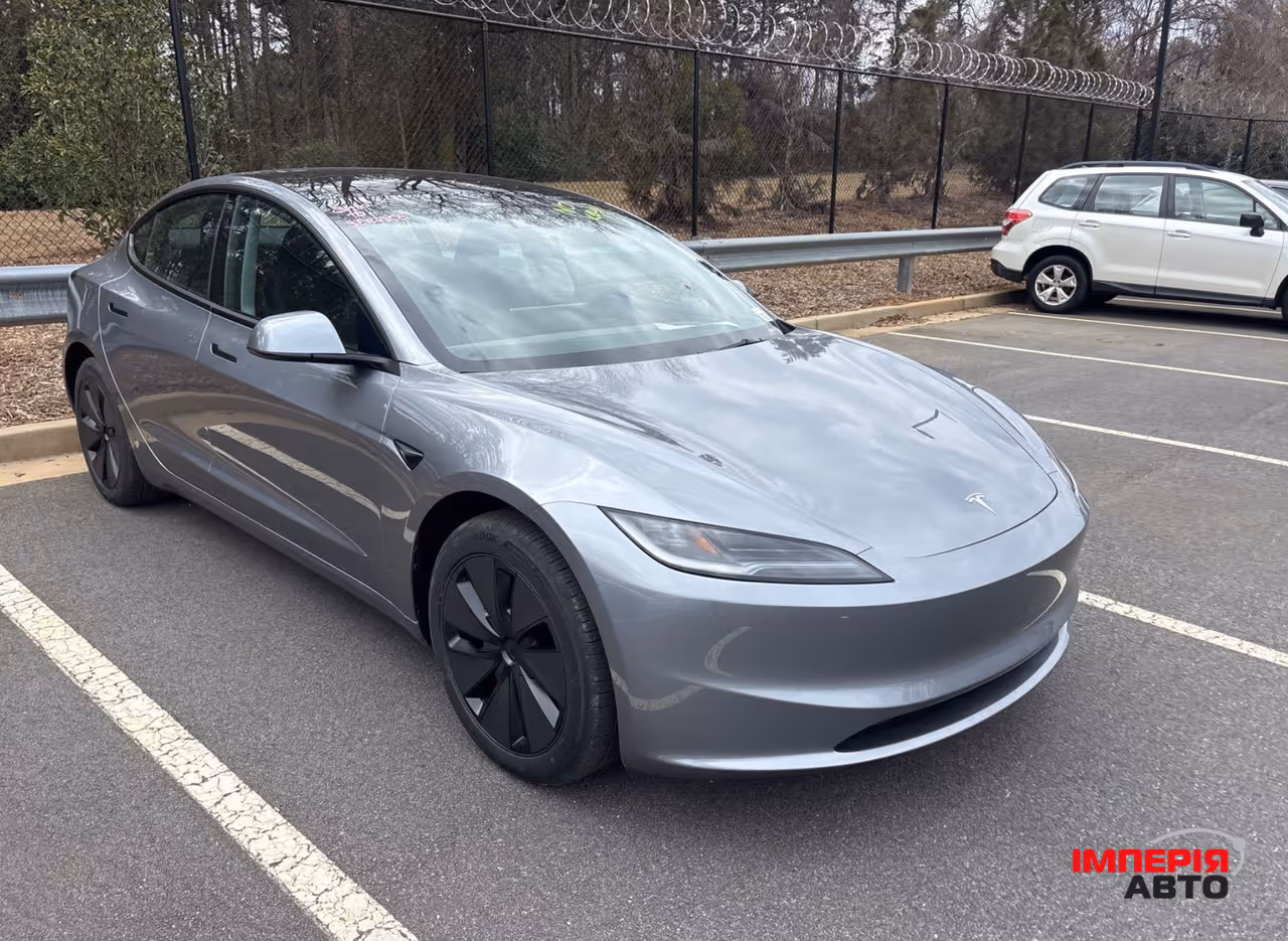 Tesla Model 3 - фото 1
