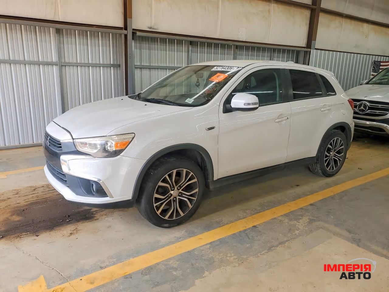 Mitsubishi Outlander Sport - фото 1