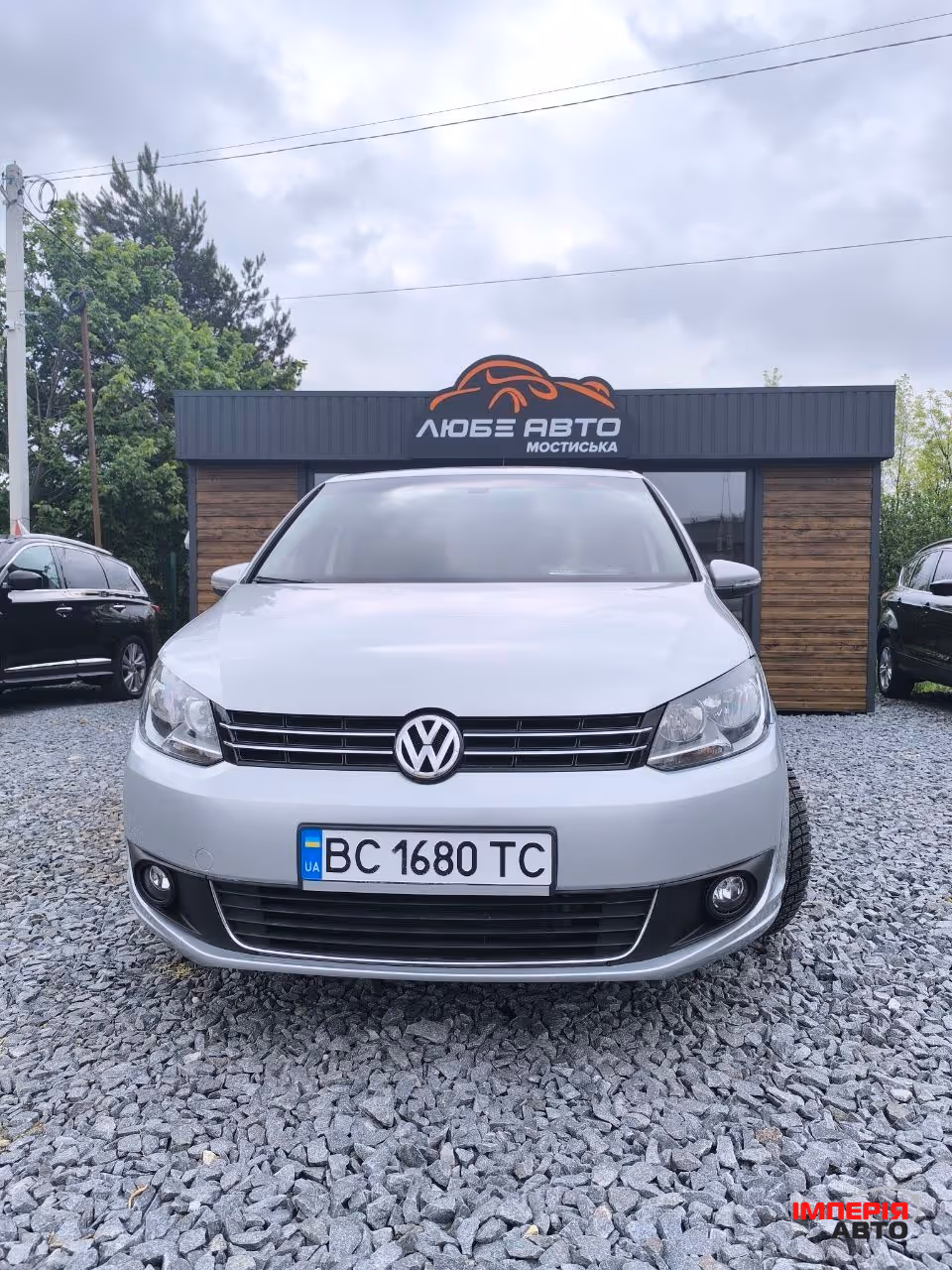Volkswagen Touran - фото 1