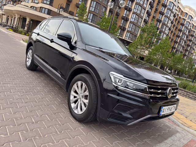 Volkswagen Tiguan - фото 1