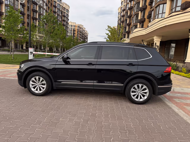 Volkswagen Tiguan - фото 5