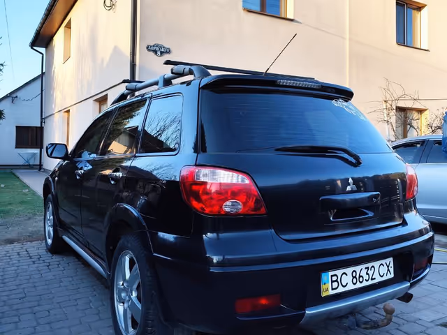 Mitsubishi Outlander - фото 5