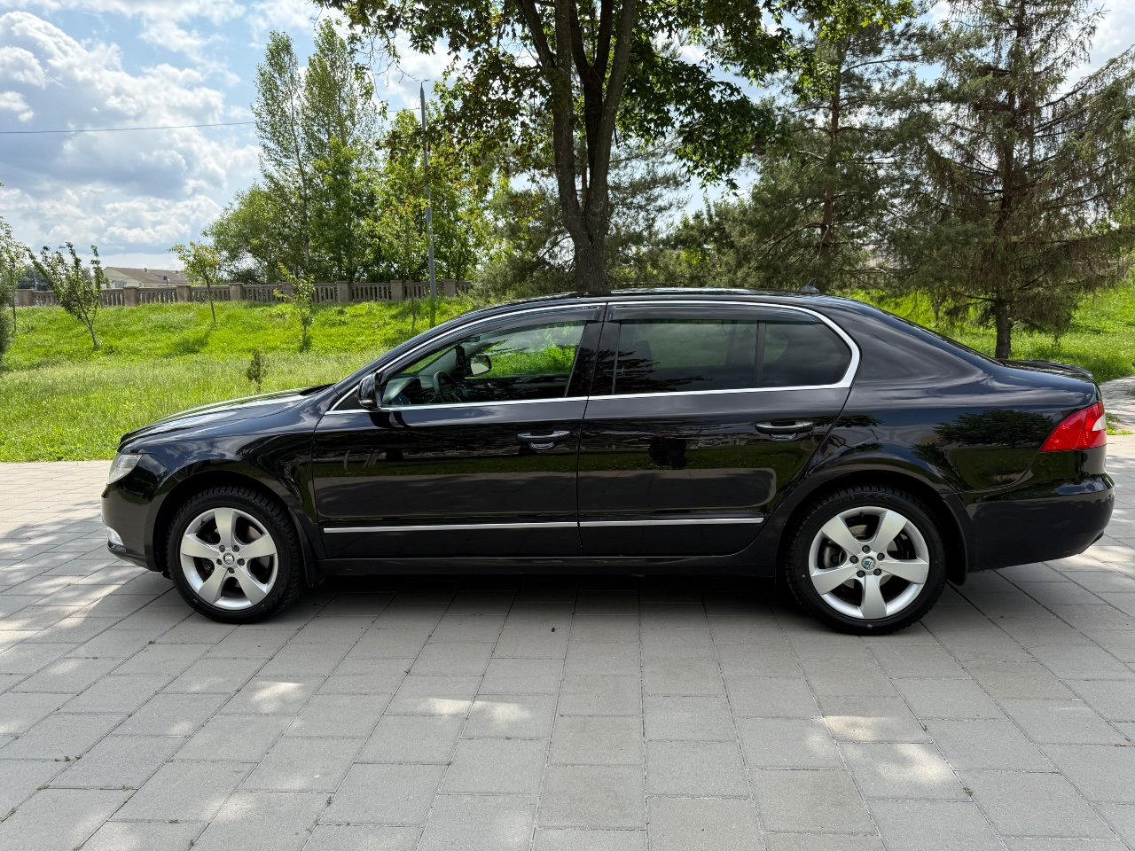 Skoda Superb - фото 12