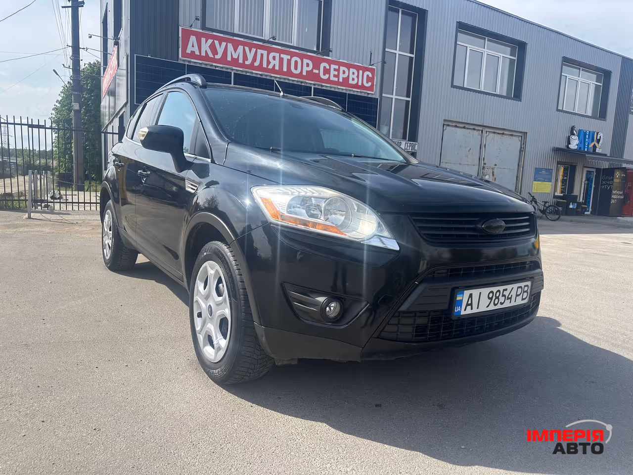 Ford Kuga - фото 1