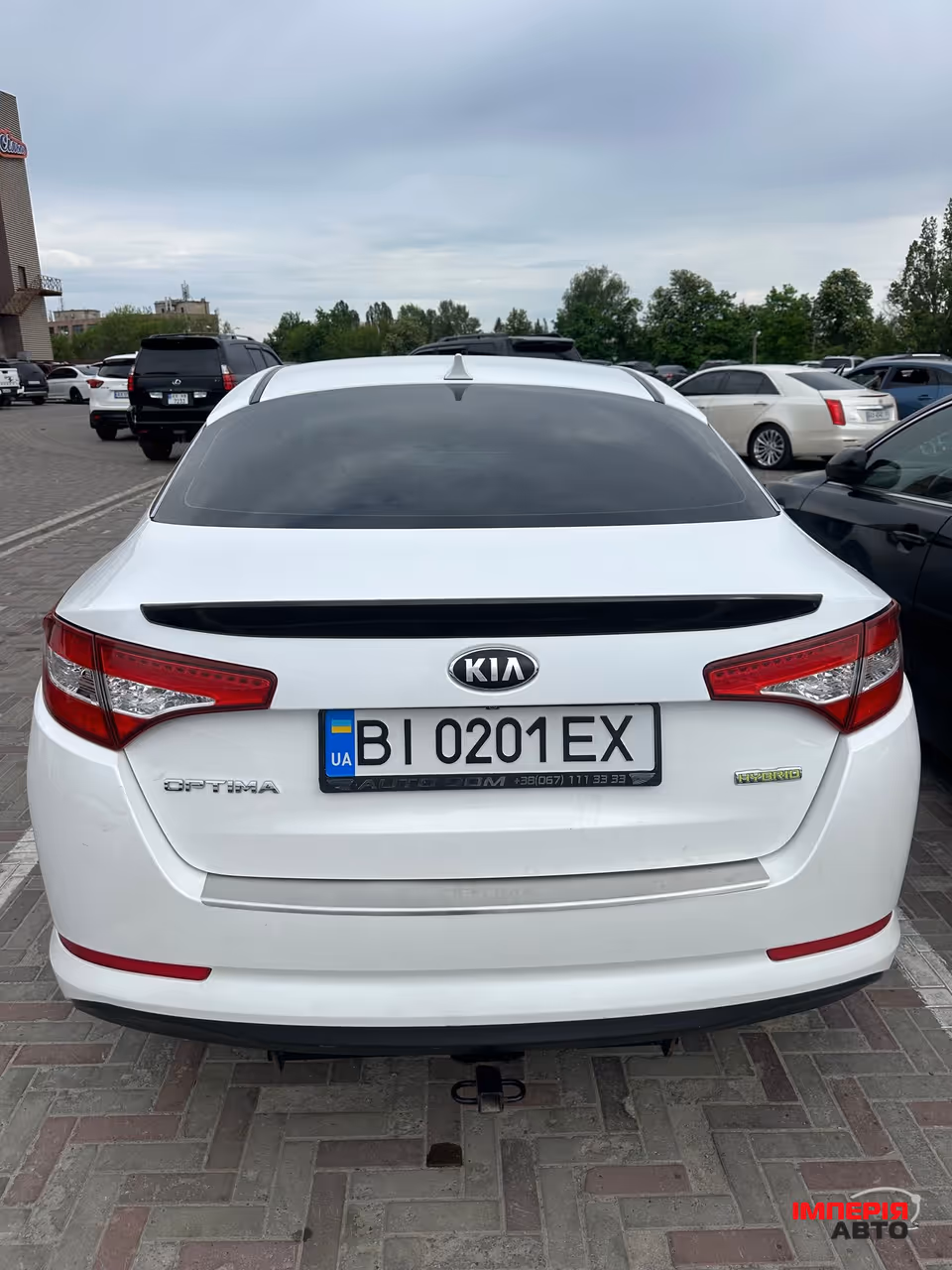 Kia Optima - фото 5