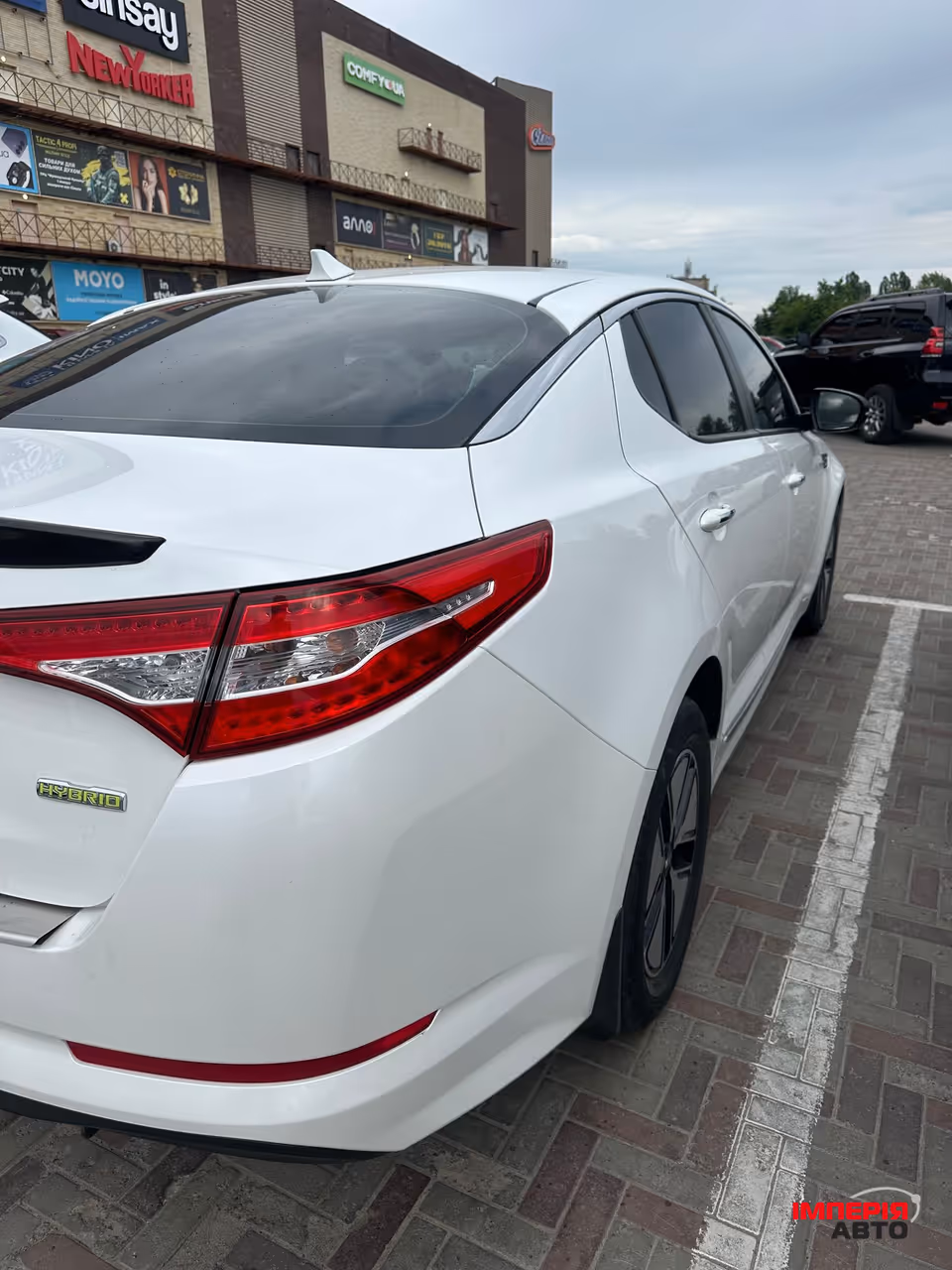 Kia Optima - фото 6