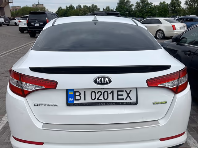 Kia Optima - фото 5