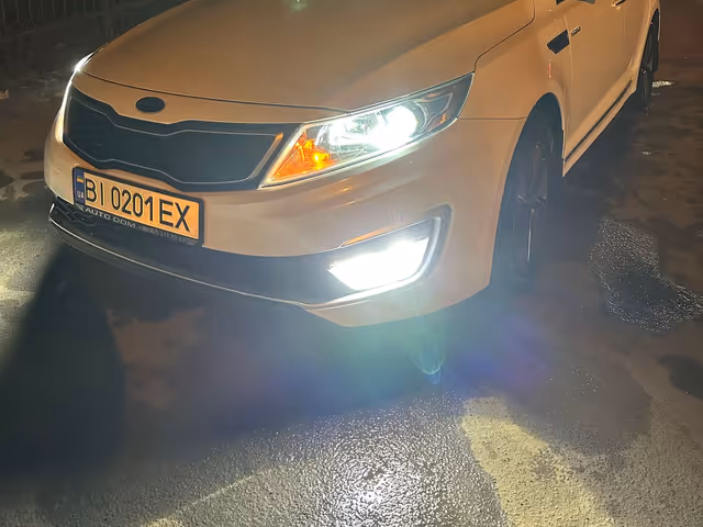 Kia Optima - фото 1