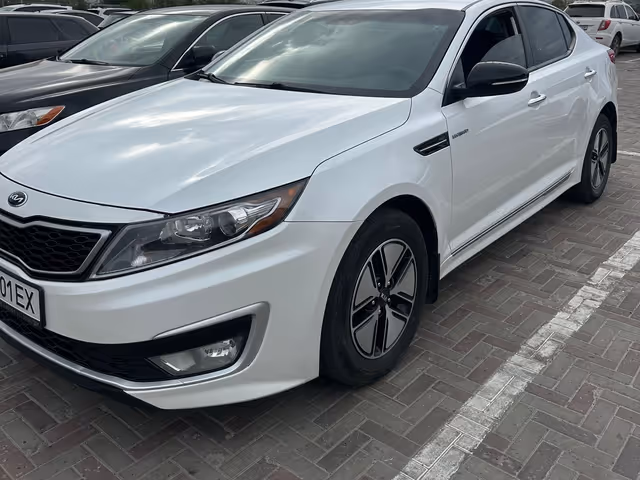Kia Optima - фото 4