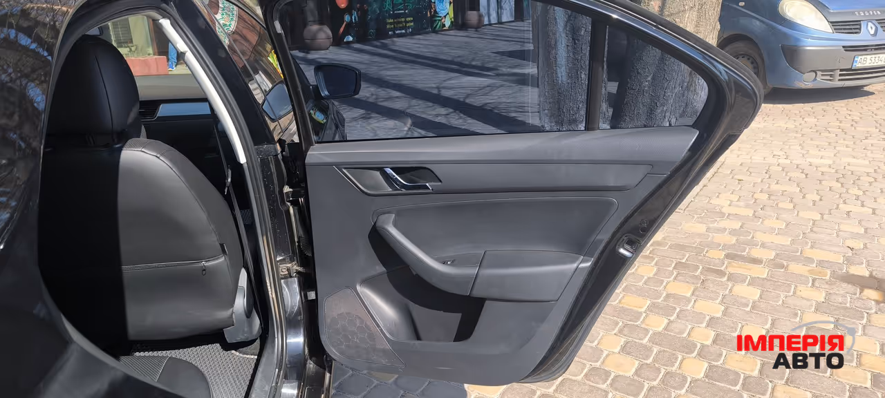 Skoda Rapid - фото 11