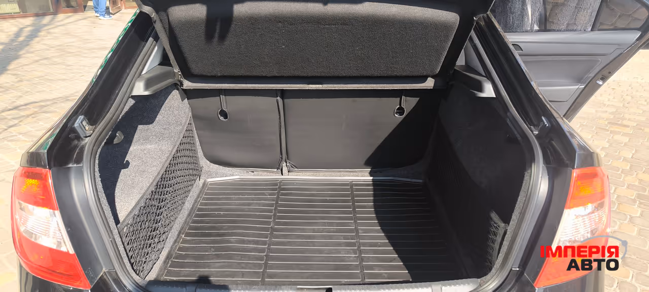 Skoda Rapid - фото 12