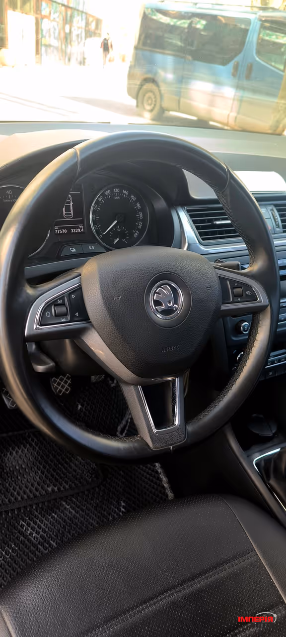 Skoda Rapid - фото 23