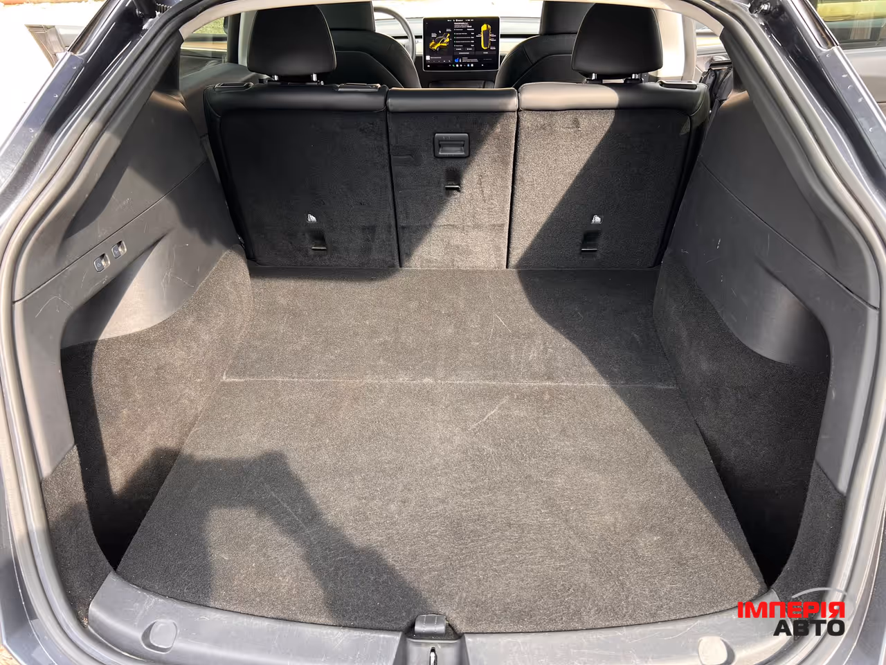 Tesla Model Y - фото 11
