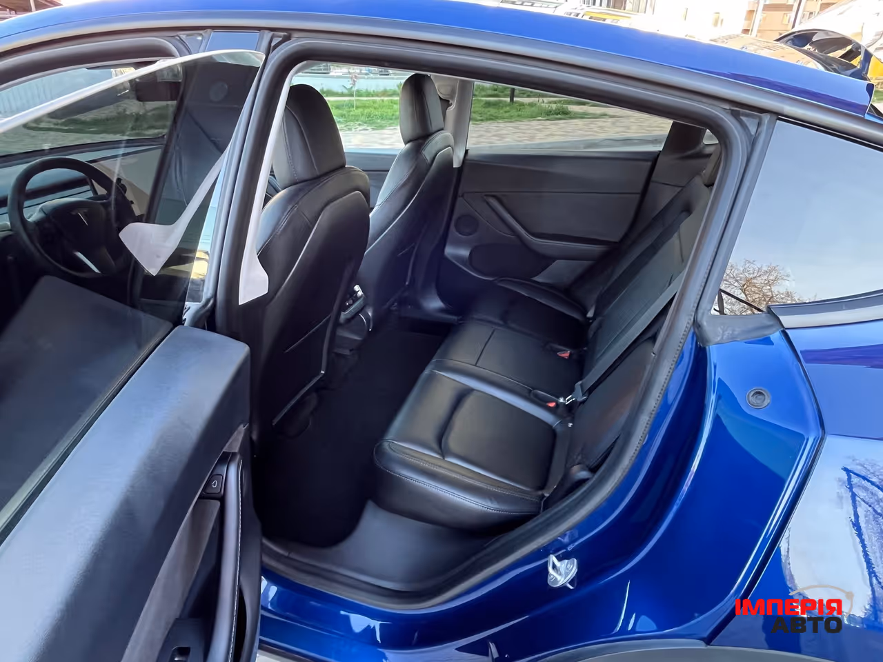 Tesla Model Y - фото 11