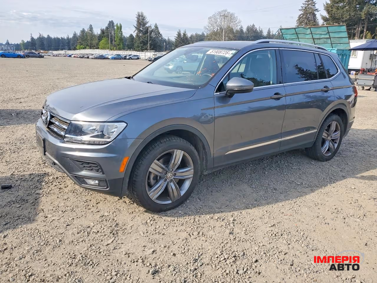 Volkswagen Tiguan - фото 1