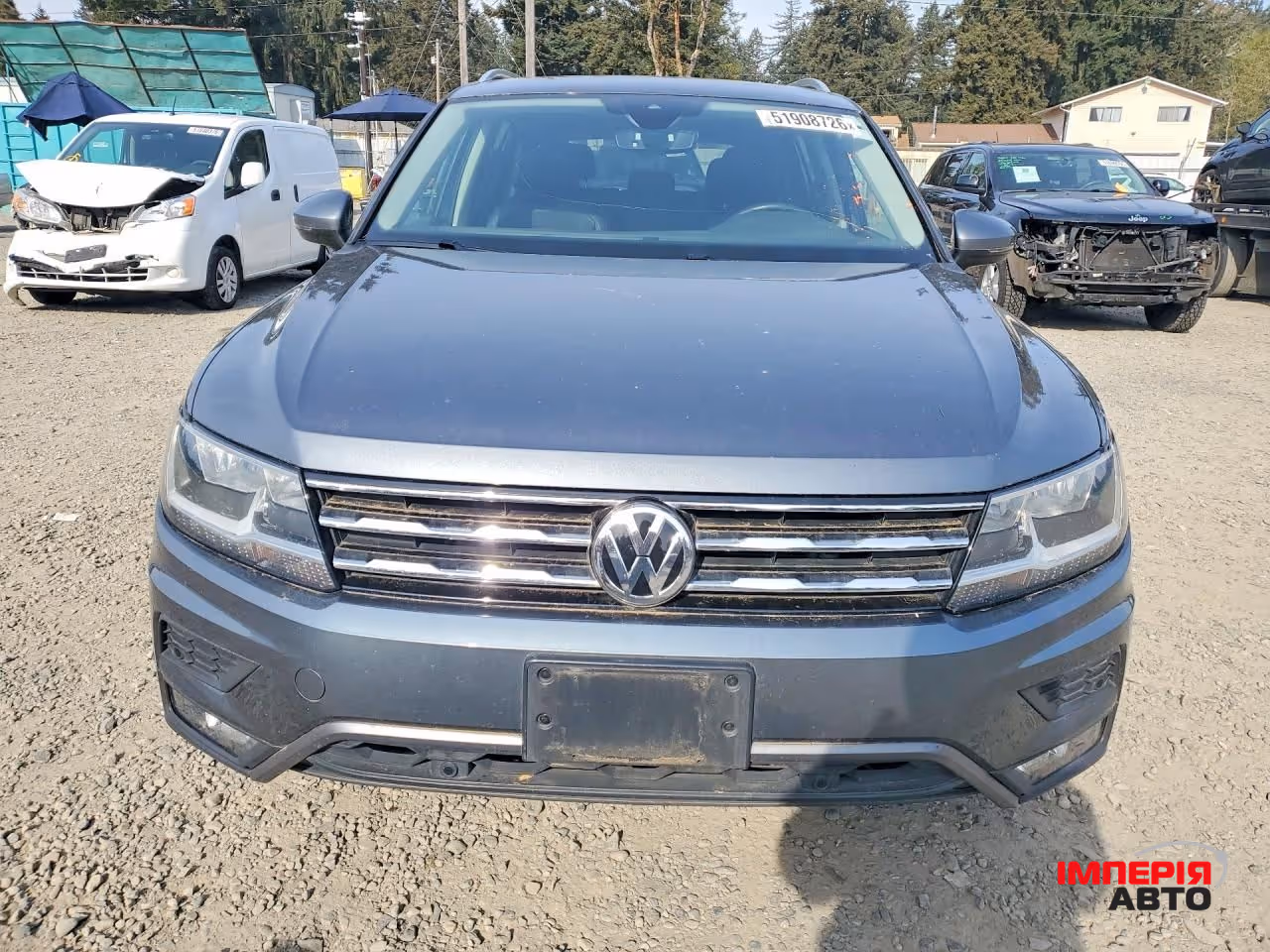 Volkswagen Tiguan - фото 5