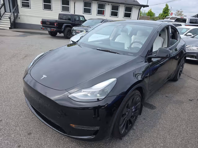 Tesla Model Y - фото 1