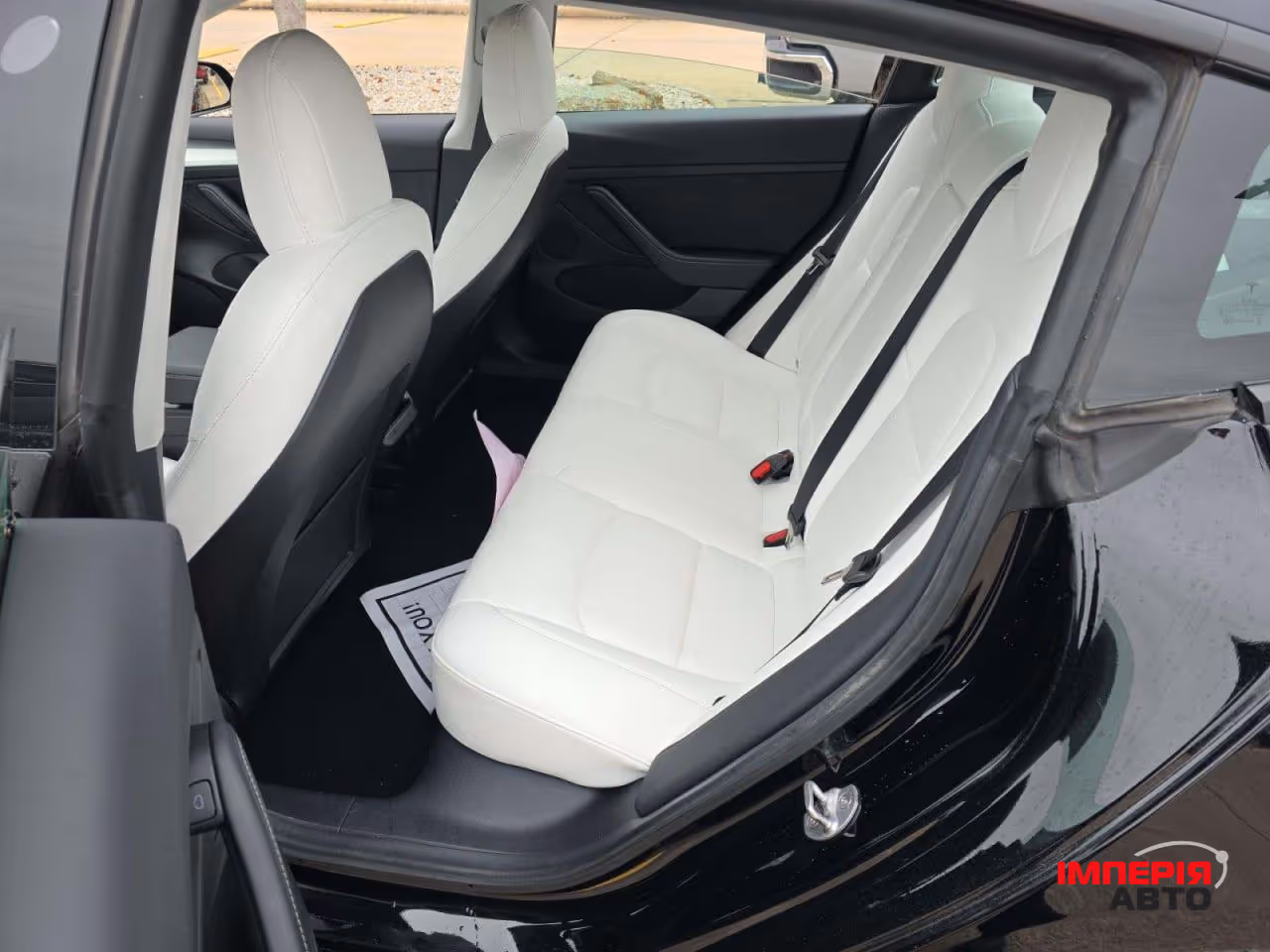 Tesla Model 3 - фото 8