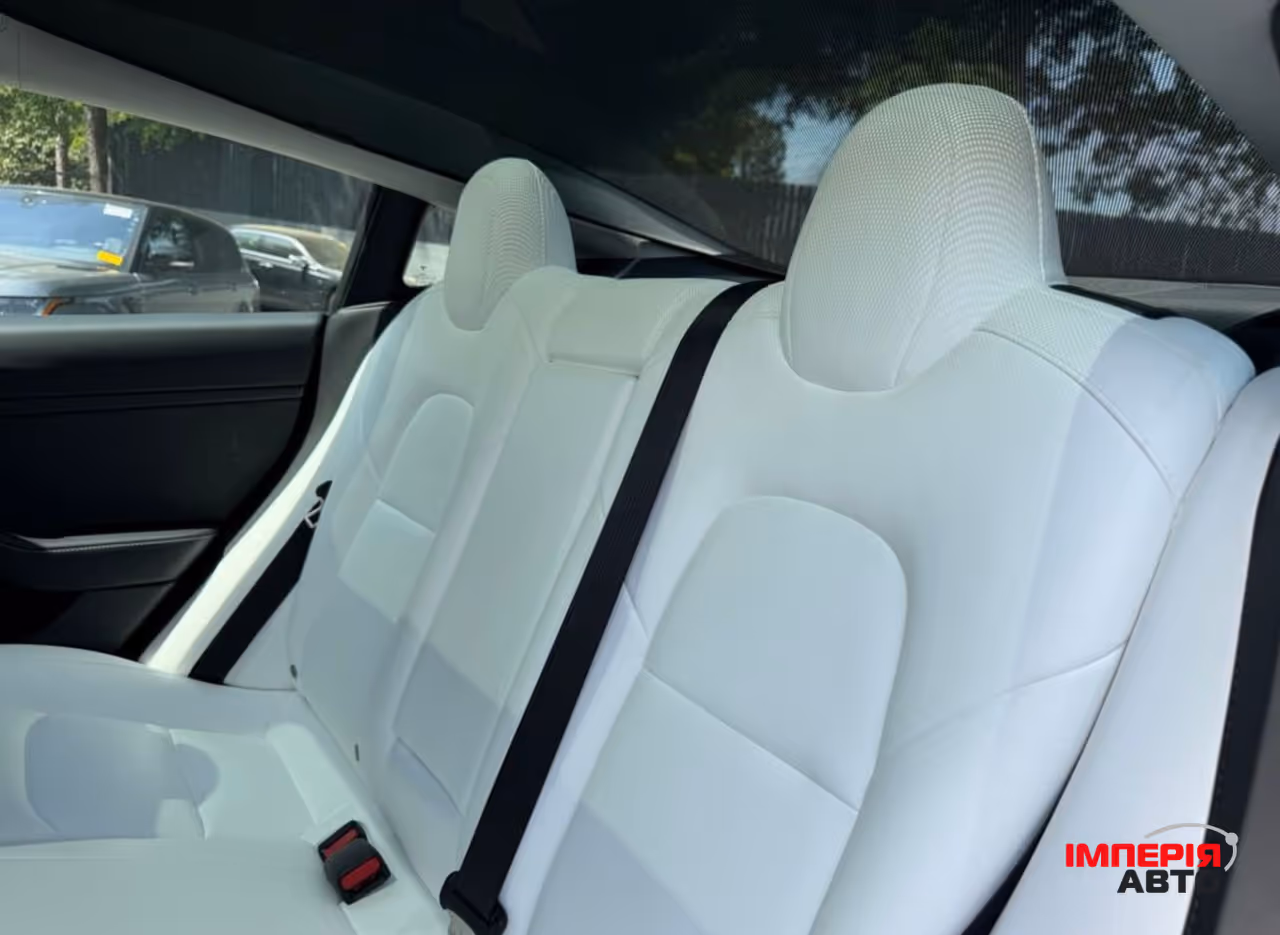 Tesla Model 3 - фото 11