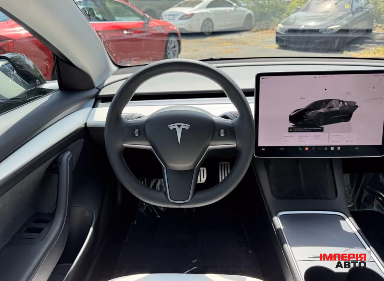 Tesla Model 3 - фото 12