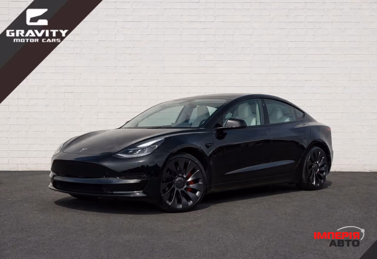 Tesla Model 3 - фото 1