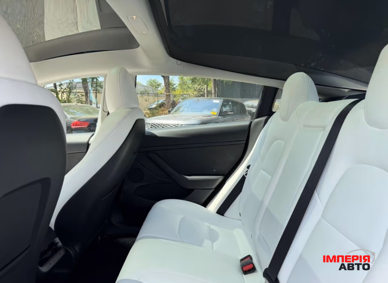Tesla Model 3 - фото 10
