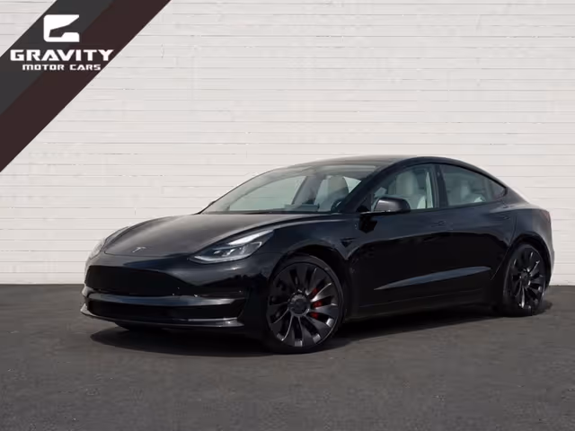 Tesla Model 3 - фото 1