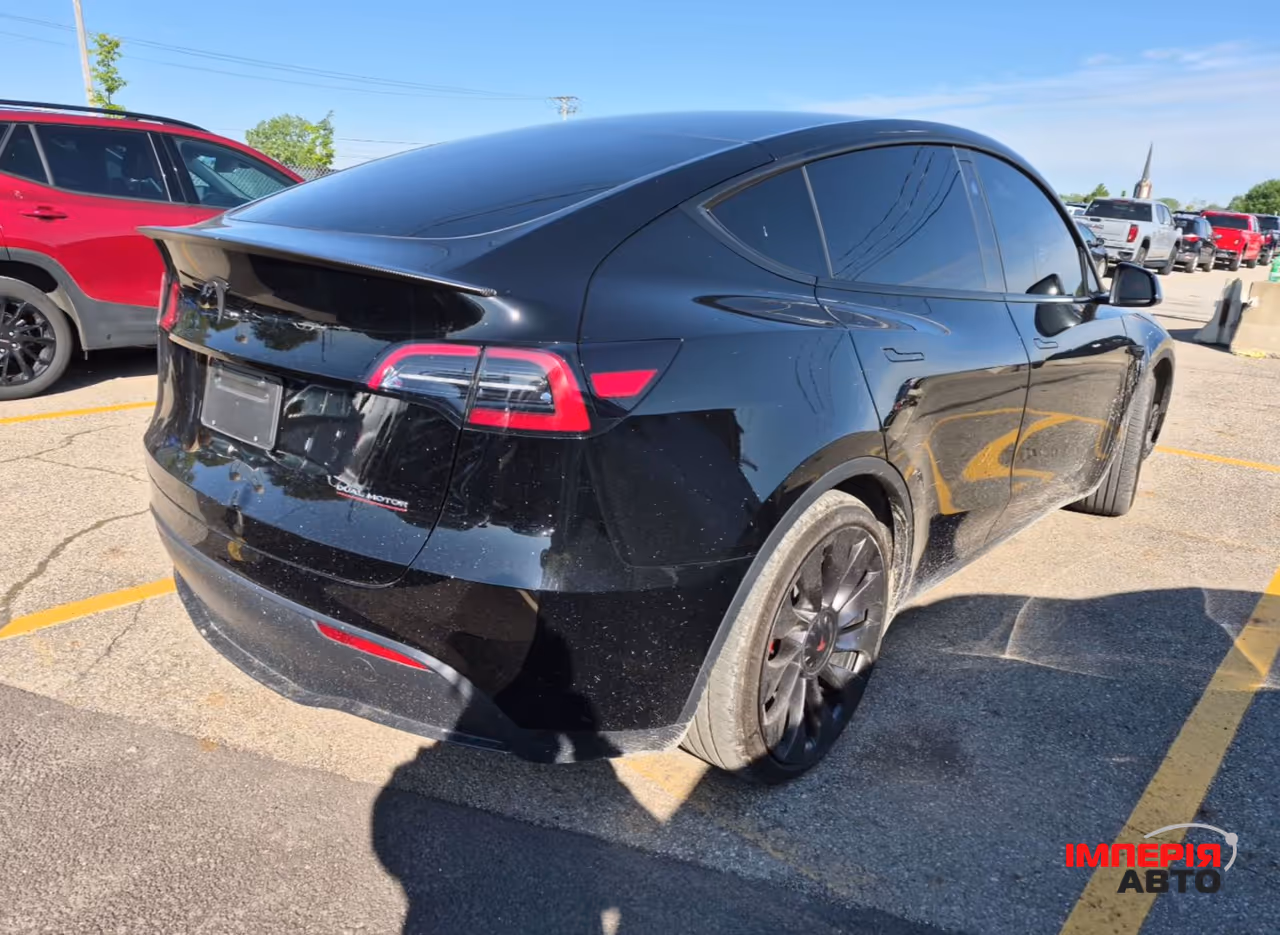 Tesla Model Y - фото 3