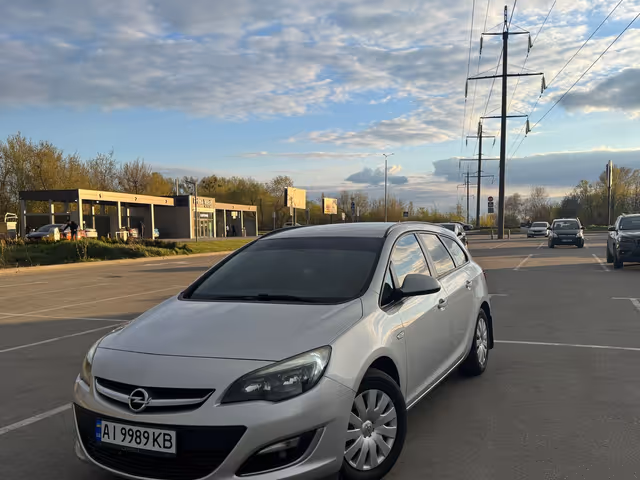 Opel Astra - фото 1