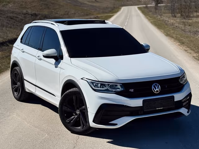 Volkswagen Tiguan - фото 1